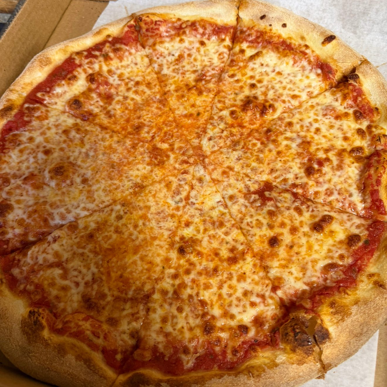 XLG Four Cheese Pizza.